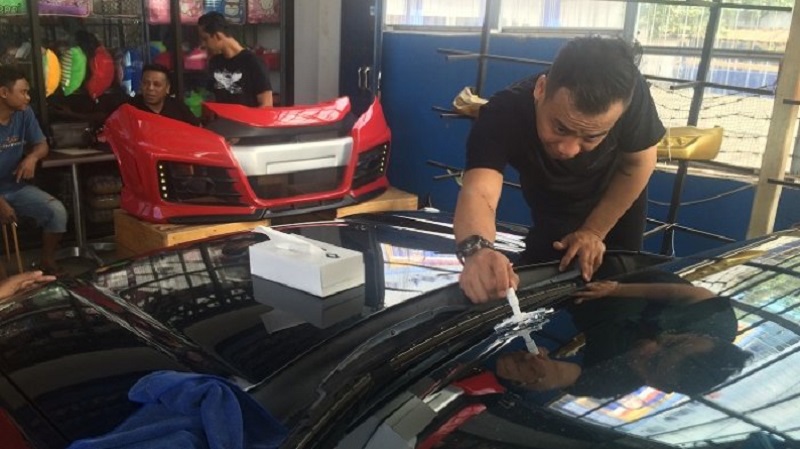 cara memperbaiki kaca mobil retak